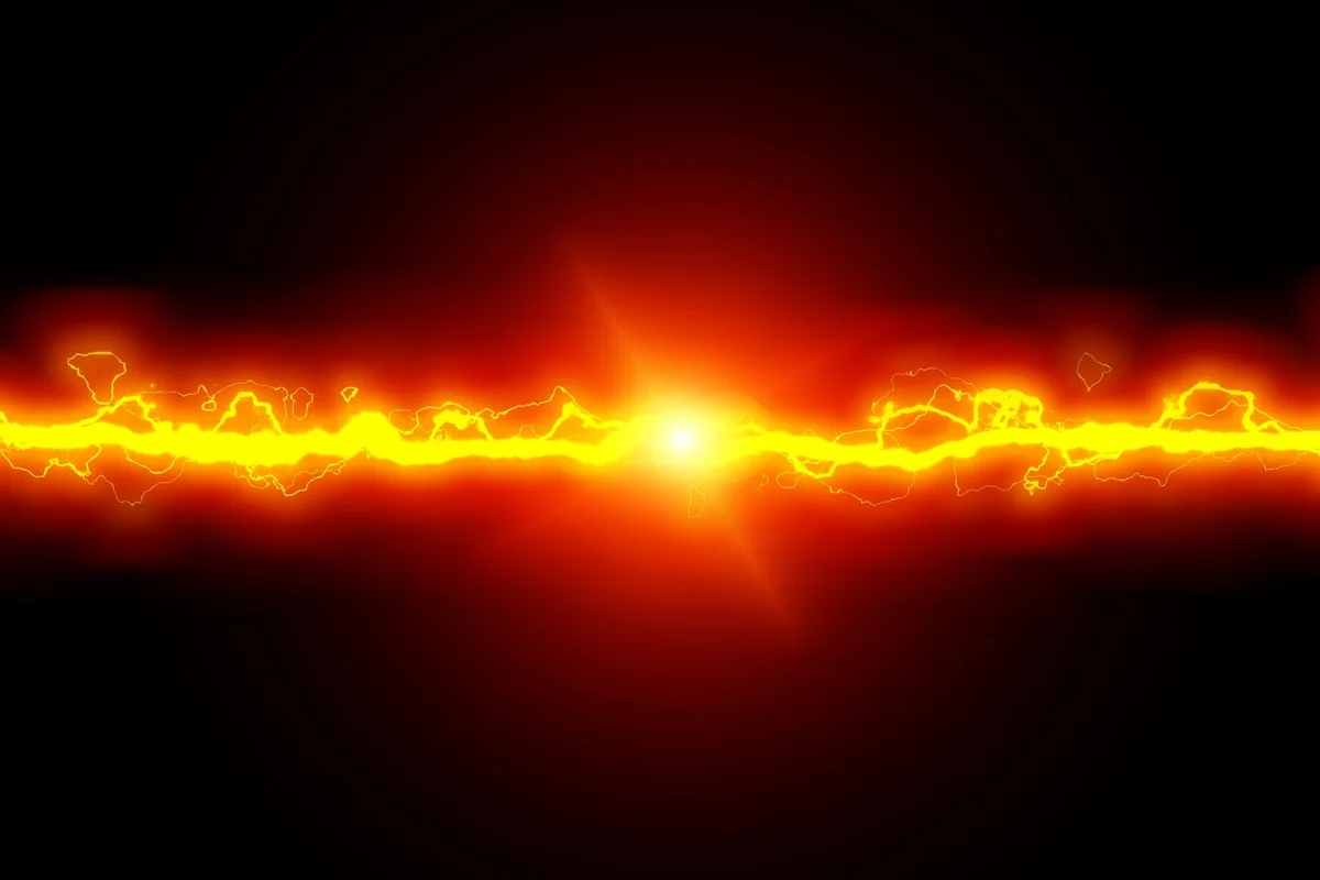 A bright yellow lightning bolt with a central white flash extends horizontally across a dark red and black background.