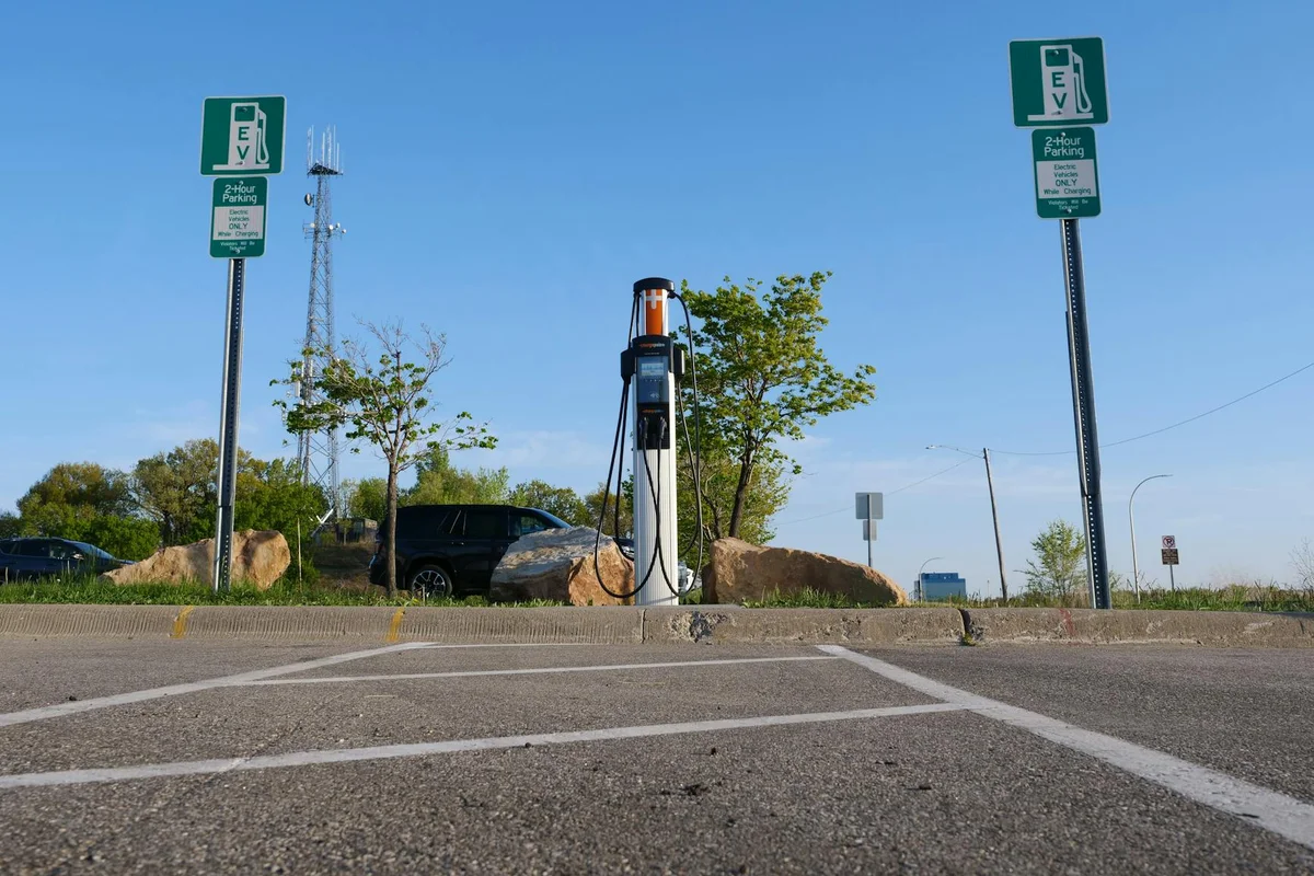 EV charging station in a city location with a focus on clean energy and modern transport.