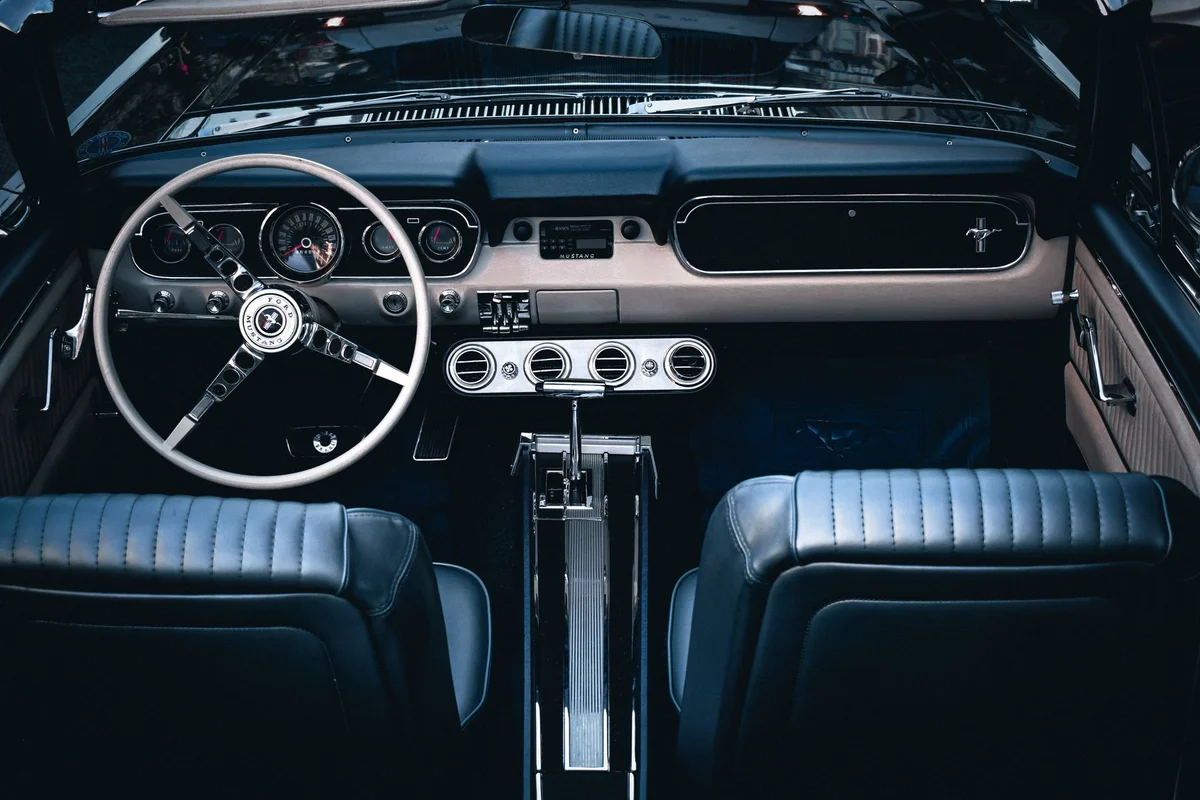 Detailed view of a classic Ford Mustang dashboard in Istanbul, showcasing vintage automotive design.