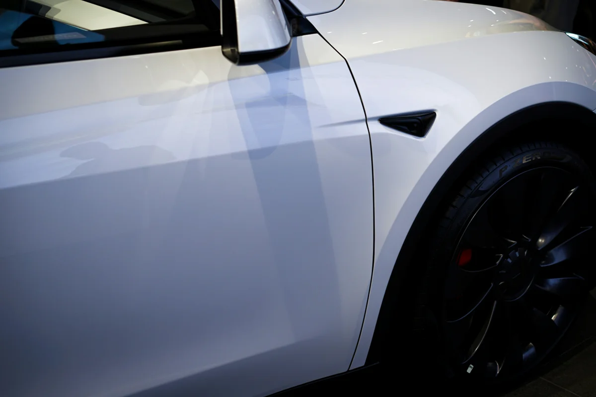 a white car with black rims