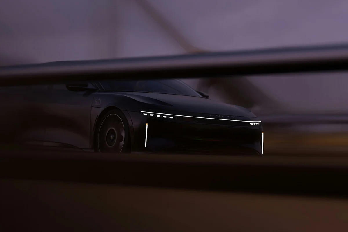 a car is seen through a window at night